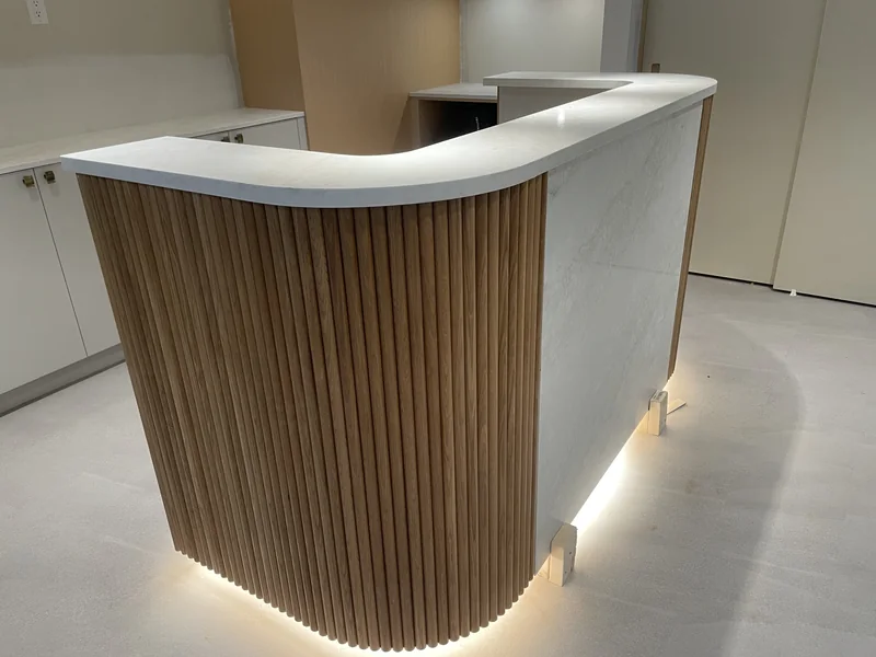 Reception countertop and curved end, side view