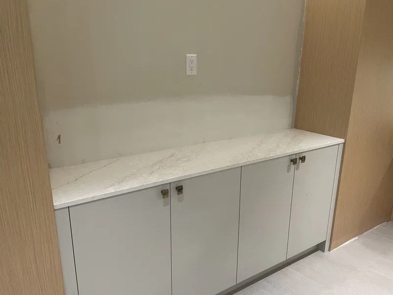 Countertop above the reception storage cabinets