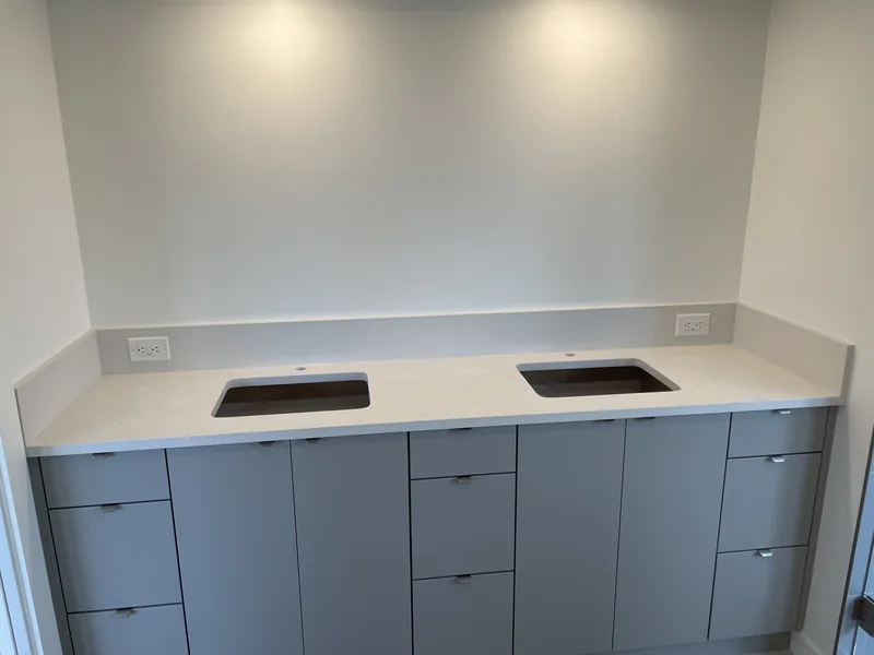 Double-basin vanity countertop before fixture installation