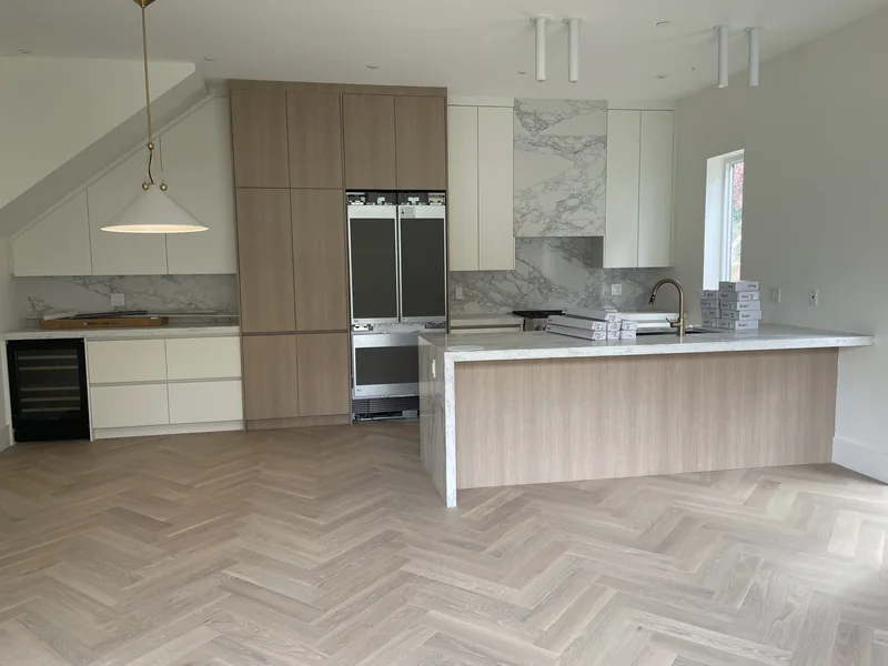 Another view of the island and full-height cabinetry